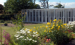 [Photograph showing Q's Cat Motel cattery and gardens]